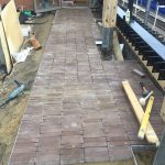 Brick paving on podium slab at West Hampstead for Ballymore